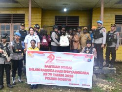 Polres Dogiyai Salurkan Bantuan Sosial Di Distrik Kamu Utara Dalam Rangka Hari Bhayangkara Ke-79